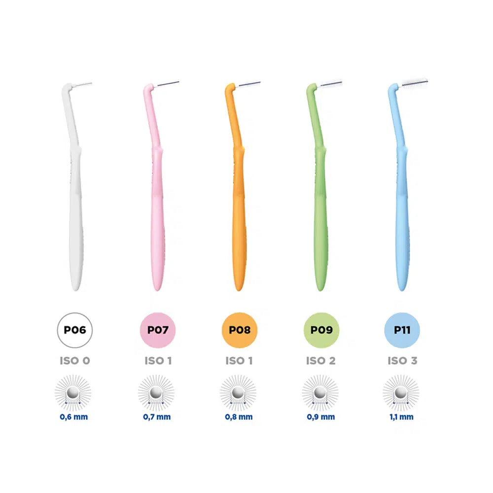 Set of dental tools with colored handles and ISO size labels on a white background